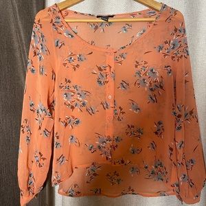 Orange floral print top in size Small only used once
